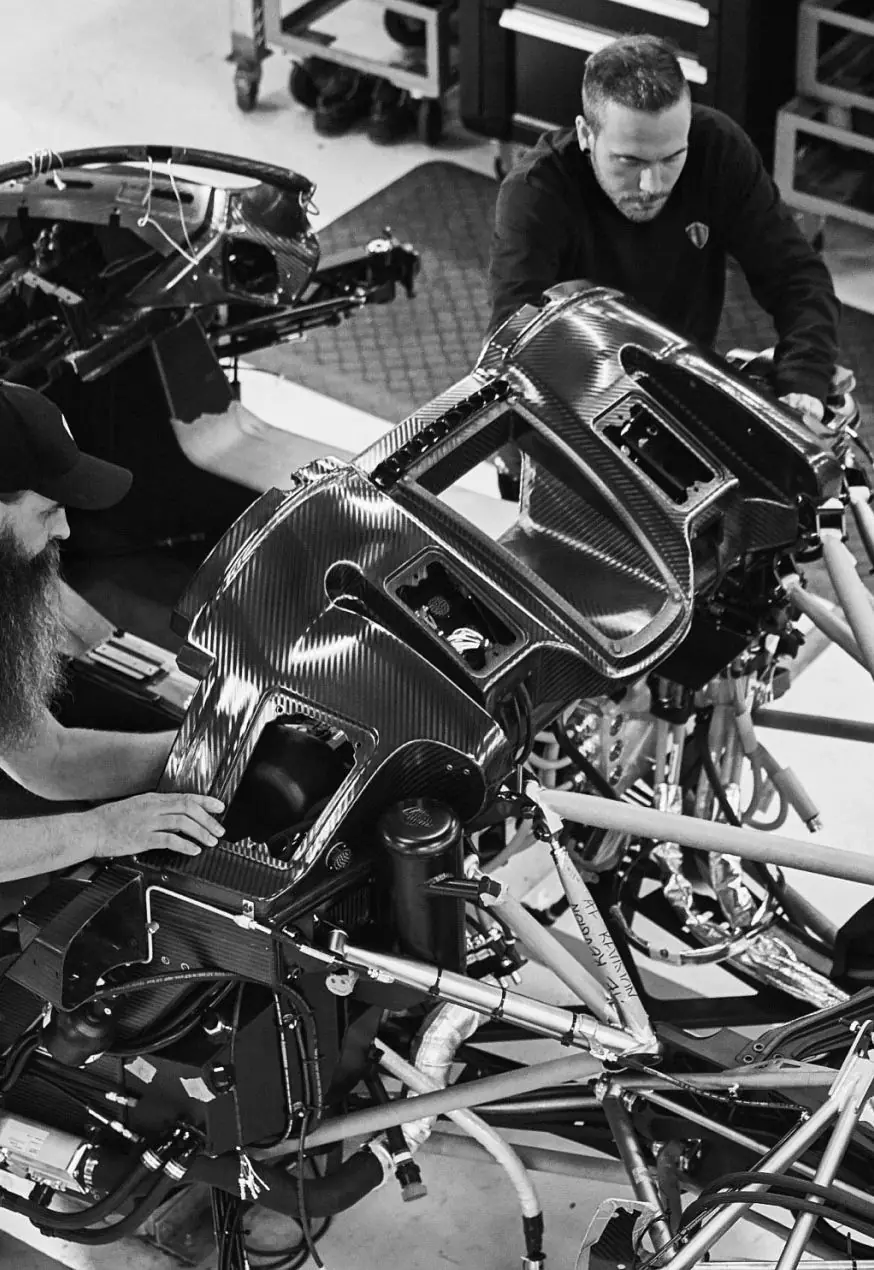 Engineers working on engine